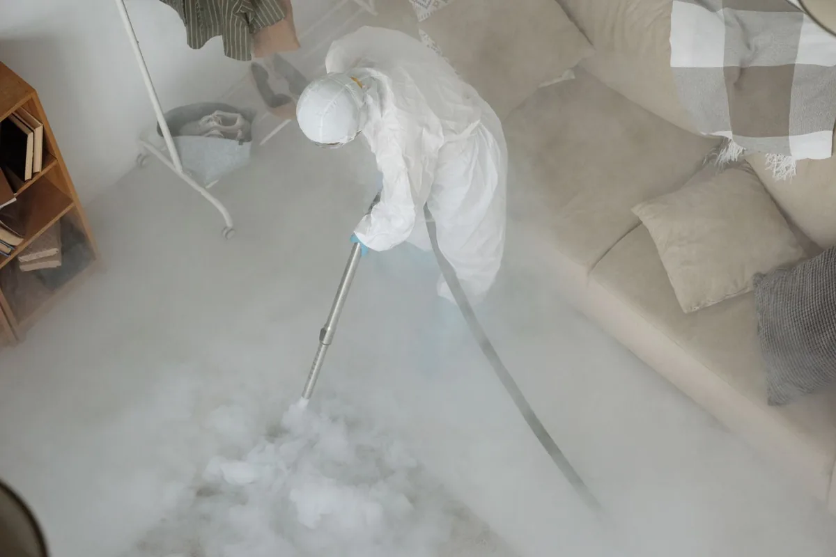 Biohazard cleanup technician in protective equipment, Pine Grove, CA